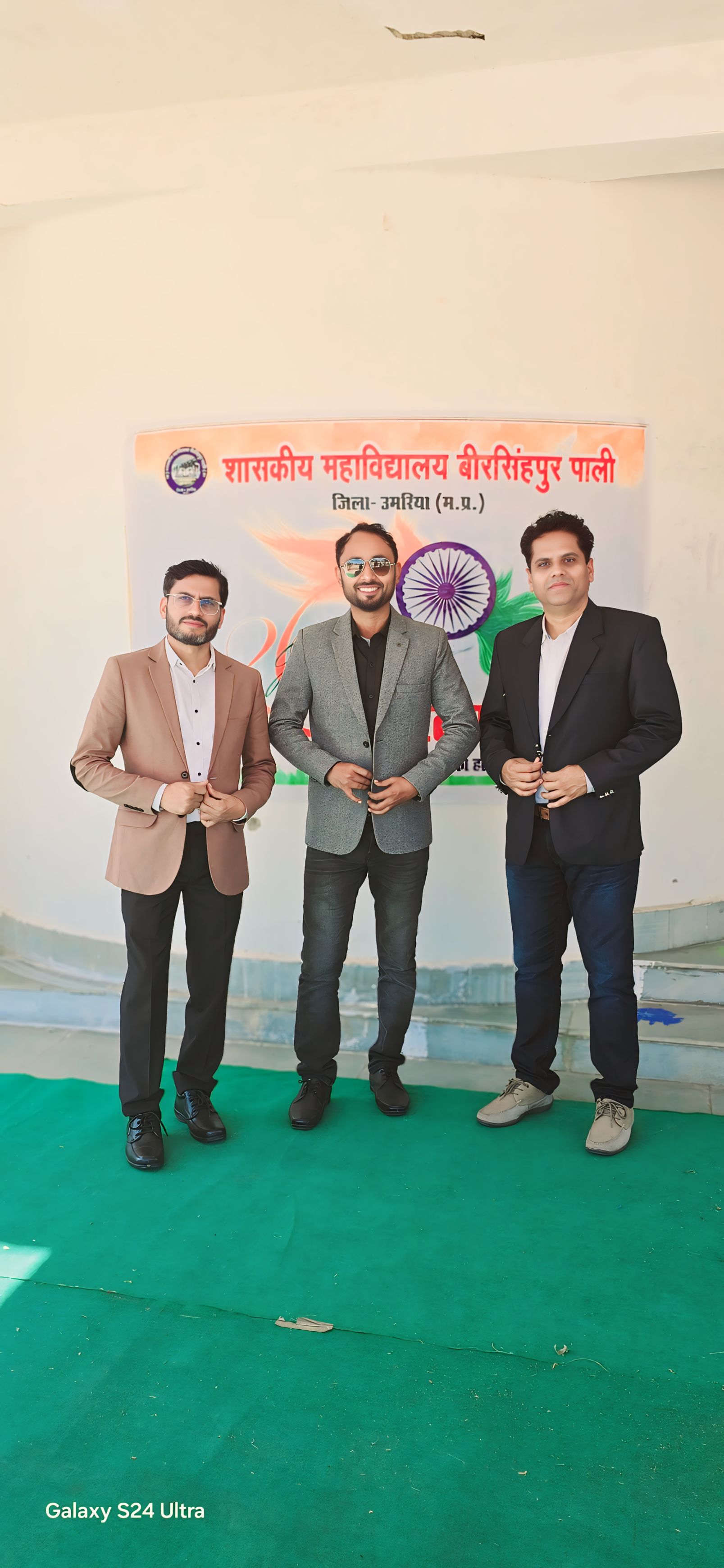 Independence Day celebration with three colleagues in formal blazers - Patriotic group photo with tricolor backdrop