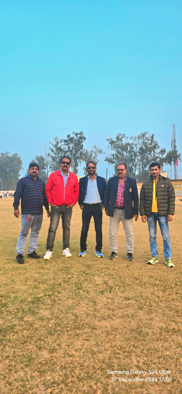 Cricket coaching session - Dr. Shamsher Ali with fellow coaches and officials during field training session