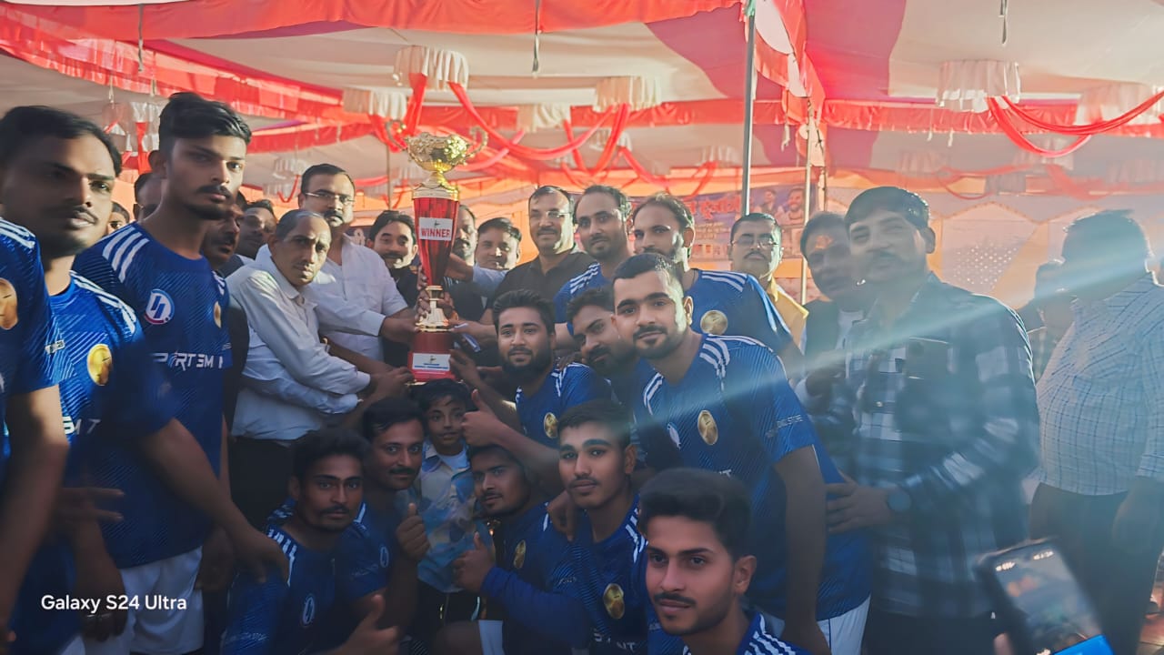 Football championship winners celebration - Team celebrating victory with trophy and medals