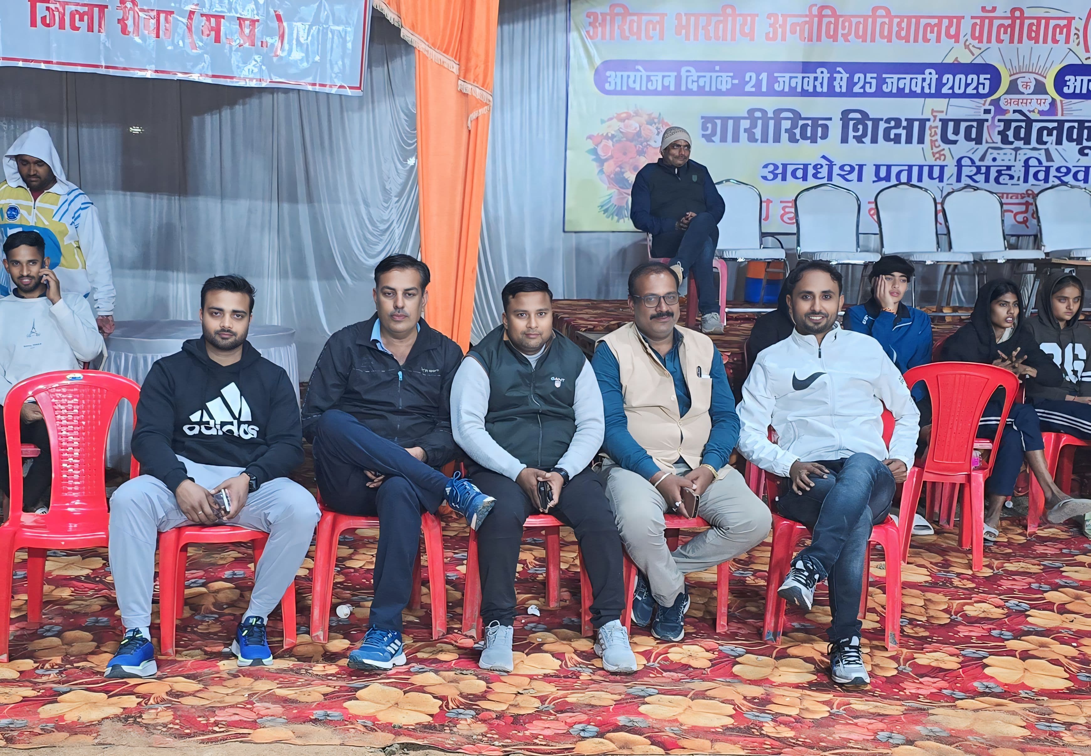 Sports event organizing committee seated together - Professional committee members in formal meeting setting