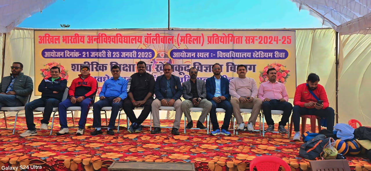 Volleyball championship judges panel on stage - Expert judges and officials overseeing volleyball tournament